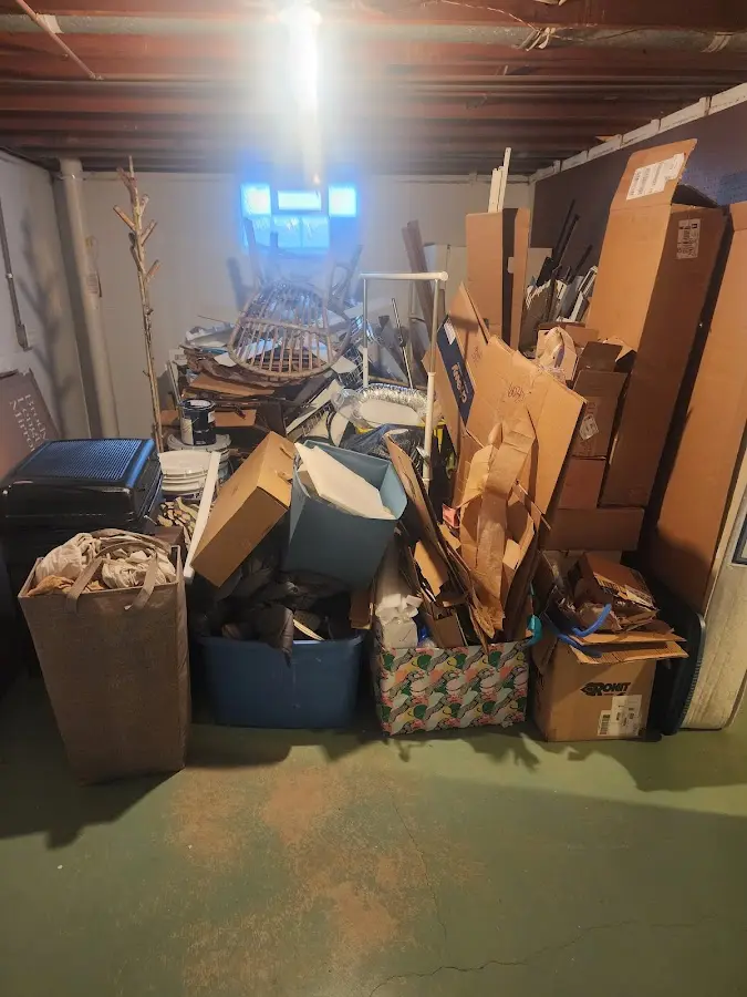 Roll-off dumpster container at job site for 8 Yard Dumpster Rental in Brutus